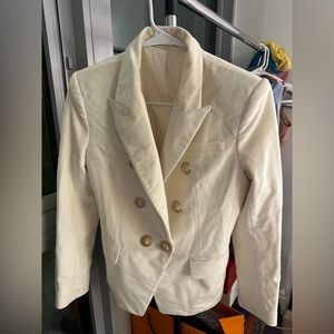 White jacket. White suit.